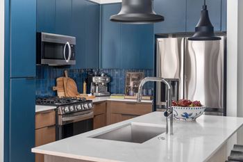 Kitchen island* with pendant lighting